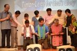 Mr. Shin and the TL Think Tank members laying hands to pray for them